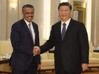 World Health Organization director general Tedros Adhanom (L) shakes hands with Chinese President Xi jinping before a meeting at the Great Hall of the People in Beijing on January 28, 2020. - China urged its citizens to postpone travel abroad as it expanded unprecedented efforts to contain a viral outbreak that has killed 106 people and left other governments racing to pull their nationals from the contagion's epicentre. (Photo by Naohiko Hatta / AFP)